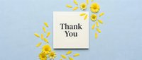 Thank you card with yellow daisy flowers and petals on light blue linen background, flat lay greeting card for appreciation and gratitude.