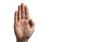 Male hand raised in stop gesture showing palm on white background isolated for design and communication concepts.