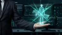 Businessman holding holographic human figure with digital network connections in modern data center representing artificial intelligence and futuristic technology concepts.