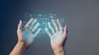 Hands holding digital network hologram with connected nodes and data visualization for technology, innovation, and business solutions.