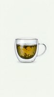 Double-walled glass mug filled with steeped herbal tea, isolated on white background, ready for beverage, wellness and kitchenware design projects.
