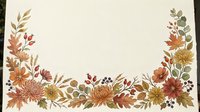Autumn floral border with chrysanthemums, rose hips, oak leaves, and berries in warm orange and earthy tones on white background with copy space.