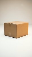 Brown cardboard shipping box on neutral background for packaging, delivery, moving and storage concepts.