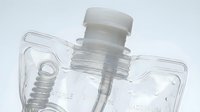 Transparent plastic bottle with pump dispenser and clear liquid inside, suitable for cosmetics, skincare products, or household cleaning solutions.