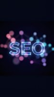 Glowing SEO text with colorful bokeh lights on dark background for digital marketing and search engine optimization concepts.