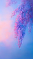 Dreamy wisteria flowers in pink and blue colors against soft pastel sky background, creating ethereal spring atmosphere for romantic design projects.