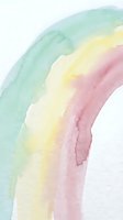 Watercolor rainbow arc with soft pastel colors blending from green to pink on white background for artistic projects and creative designs.