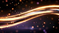 Glowing golden light trails with sparkles and bokeh effects on dark background create magical atmosphere for festive designs and celebrations.