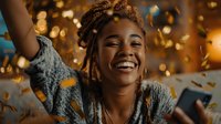 Young African American woman celebrating with confetti and golden bokeh lights background for party and festive occasions.