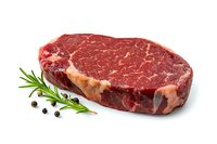 Raw marbled ribeye steak with fresh rosemary sprig and black peppercorns on white background, premium cut of beef meat isolated for culinary and menu design.