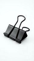 Black metal binder clip isolated on white background for office supplies and document organization needs.