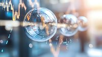 Transparent soap bubbles floating against blurred stock market chart background with financial data and glowing light effects, representing market volatility and speculation.