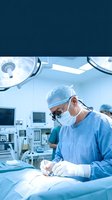 Focused surgeon performing precise operation in modern operating room with advanced medical equipment and sterile environment for patient care.