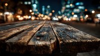Weathered wooden planks surface with blurred city lights bokeh background at night. Urban street scene with warm glowing lights for product display.