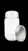 Empty glass mason jar with silver metal screw-on lid isolated on transparent background, ready for clipart, sublimation, print-on-demand designs, stickers, and craft projects.