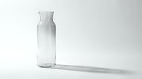 Minimalist clear glass carafe casting a soft shadow on a white background, isolated and ready for design use.
