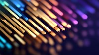 Colorful pencils arranged in diagonal line with vibrant rainbow gradient colors against dark background, creating artistic bokeh effect and depth of field.