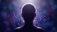 Male silhouette surrounded by floating purple bubbles with glowing backlight creating mystical atmosphere for meditation and wellness concepts.