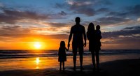 Family silhouettes holding hands on beach at sunset with golden sky and ocean waves reflecting warm light creating peaceful moment together.