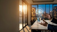 Business professional holding glowing lightbulb with gears in modern office at sunset representing innovation and creative problem-solving concepts.