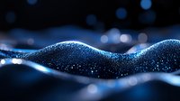 Glowing blue particles forming dynamic wave pattern on dark background with bokeh effect and shimmering dots, suitable for technology and data concepts.