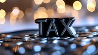 Black blurred golden bokeh lights in background, representing financial and taxation concepts. Business accounting theme.