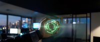 Businessman holding glowing digital hologram with green circular interface in modern office environment with city skyline view through windows.