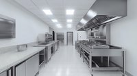 Professional commercial kitchen interior with stainless steel equipment, white walls, and modern ventilation system. Clean industrial cooking space with countertops and storage.