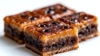 Freshly baked chocolate chip cookie bars with golden caramelized crust, layered dessert squares on white background, close-up food photography.