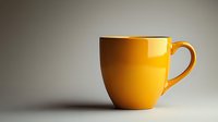 Yellow ceramic coffee mug on neutral background with soft shadow and copy space, minimalist composition for beverage and lifestyle designs.