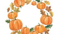 Autumn pumpkins and fall leaves arranged in a circular wreath frame with white center space, ideal for seasonal greeting cards and harvest designs.