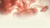 Abstract flowing smoke in warm coral and peach tones creating elegant curves and wisps against soft gradient background for modern design projects.