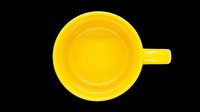 Bright yellow ceramic cup with handle isolated on transparent background, ready for t-shirt design, clipart, stickers, print-on-demand products and sublimation projects.