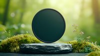Dark green circular mirror reflecting nature placed on moss-covered stone in forest setting with soft bokeh background for spa wellness branding.