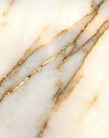 Elegant white marble texture with golden veins and natural stone patterns for luxury interior design and sophisticated backgrounds.