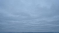 Overcast sky with gray clouds creating moody atmospheric background for weather concepts and seasonal designs.