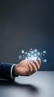 Male hand in business suit holding smartphone with glowing digital blockchain network, security locks and gear icons floating above screen.