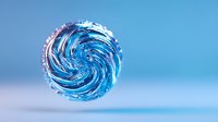 Swirling blue glass sphere with spiral pattern captured in macro photography against soft blue background, showcasing intricate detail and light refraction effects.