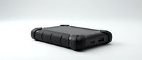 Rugged black external hard drive with protective bumpers and ports isolated on white background, ready for design use.