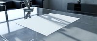 Modern minimalist office workspace with blank white paper document on glass desk surface ready for business presentation or contract signing.