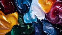 Vibrant acrylic paint swirls in rainbow colors creating abstract fluid art pattern. Colorful artistic background for creative projects and designs.