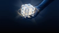 Glowing translucent cube structure held in hand against dark background with blue light effects, representing innovation, technology, data processing, and digital transformation concepts.