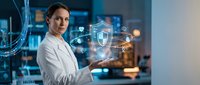 Professional woman in white lab coat interacting with holographic cybersecurity interface displaying shield icons and network connections in modern laboratory.