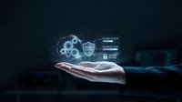 Businessman hand holding glowing globe with shield and security icons, representing global data protection, cybersecurity solutions, and network safety for enterprise systems.