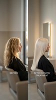 Hair transformation before and after keratin treatment showing blonde woman with frizzy curly hair becoming sleek straight hair in salon mirror.