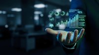 Businessman hand holding digital holographic display with financial analytics charts, growth metrics, and sustainability data visualization in modern office environment.