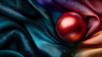 Shiny red pearl on luxurious silk fabric with dramatic lighting and deep shadows creating elegant composition. Smooth satin texture flows with rich teal and copper tones.