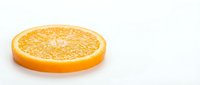Fresh orange slice isolated on white background, ready for food and beverage design projects, packaging, and culinary content.