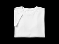 Blank white t-shirt folded with tag isolated on transparent background, ready for design use on apparel, sublimation, print-on-demand products, and custom merchandise projects.