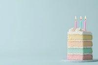 Pastel layered birthday cake with white frosting and three lit pink candles on minimal blue background. Celebration dessert with vanilla buttercream.